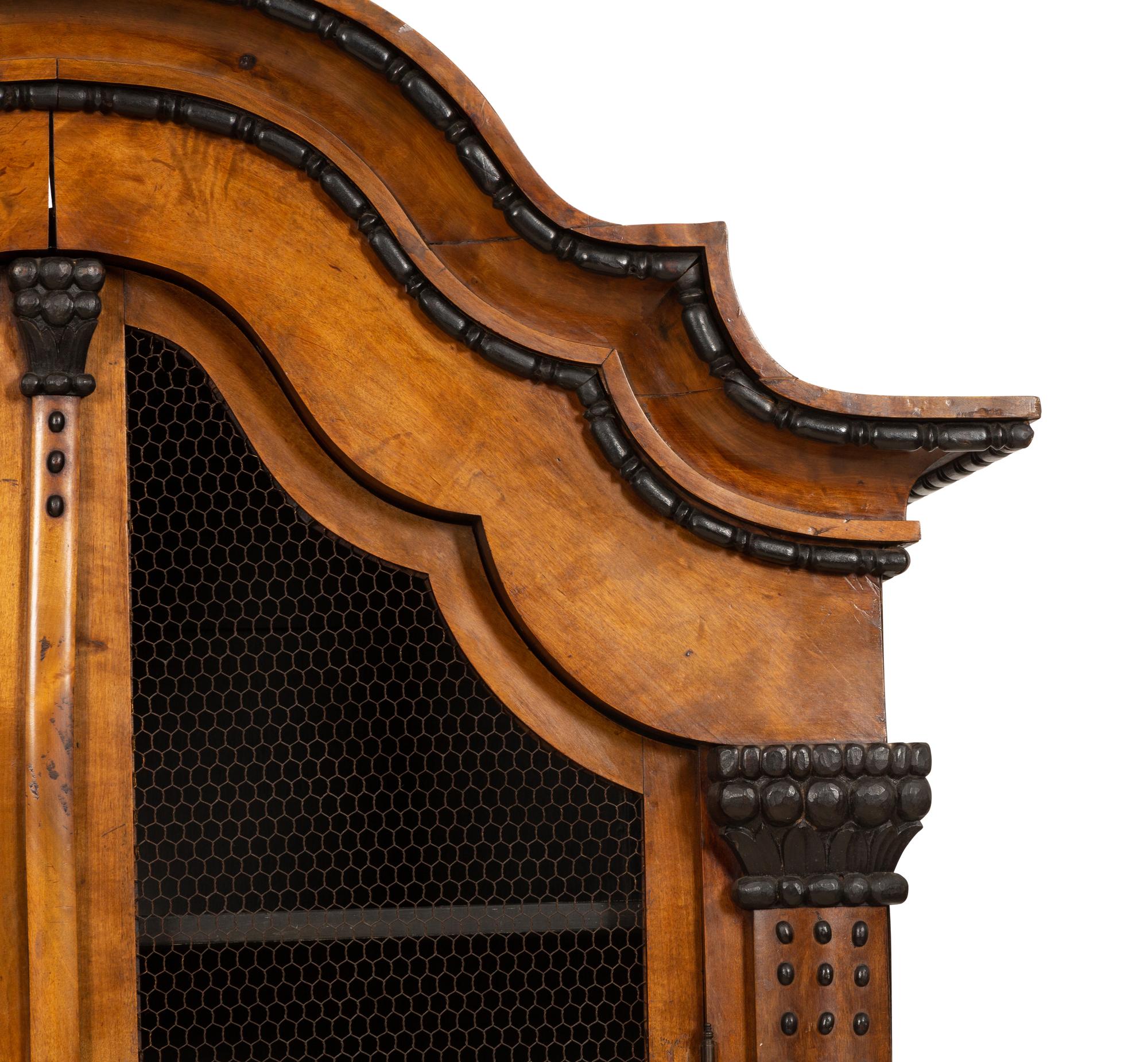 A Pair of Biedermeier Part-Ebonized Fruitwood Bookcases