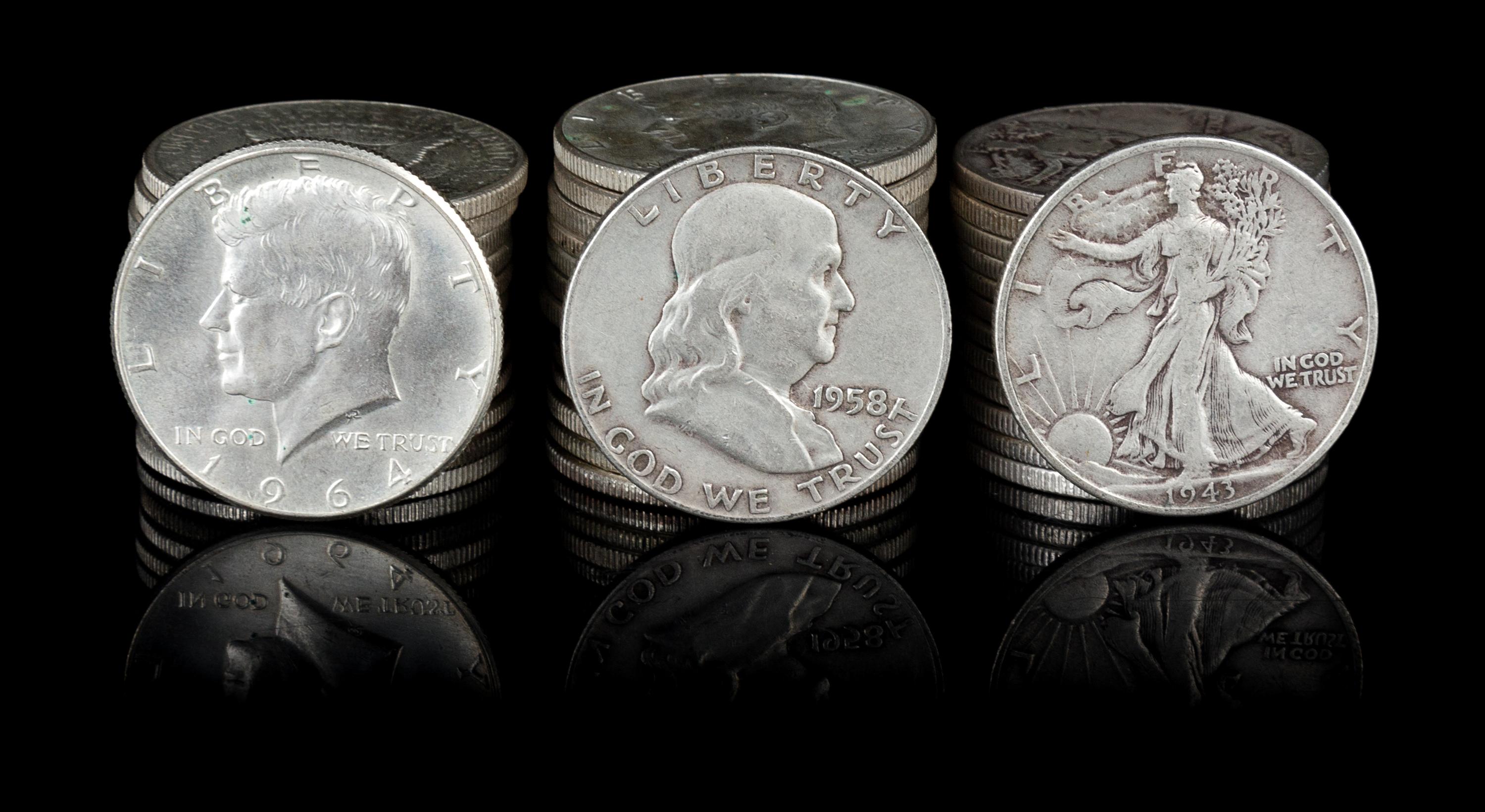 A Group of American Pennies, Half-dollars and Silver Dollars