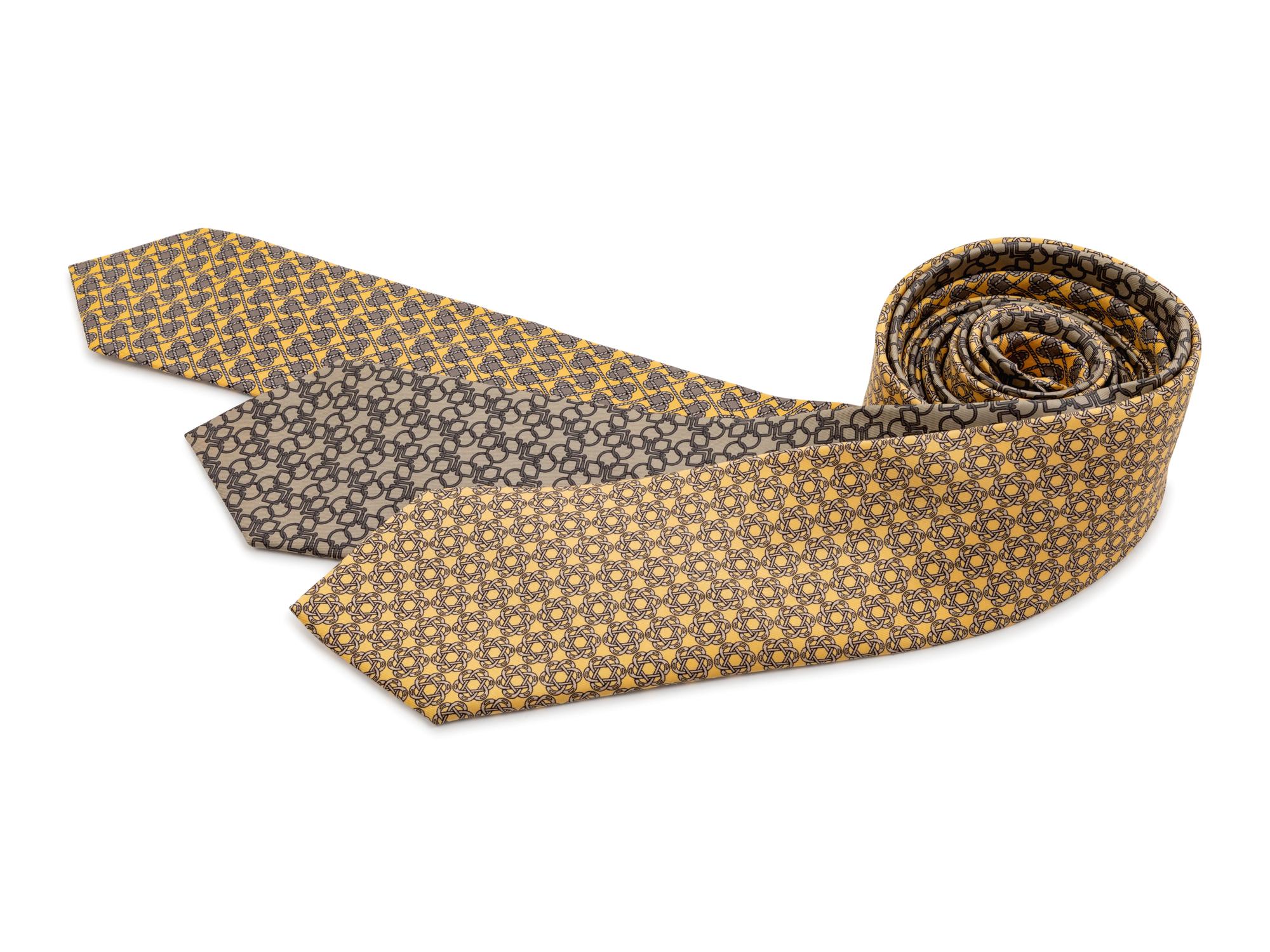 Three Hermes ties, two yellow, one gray
