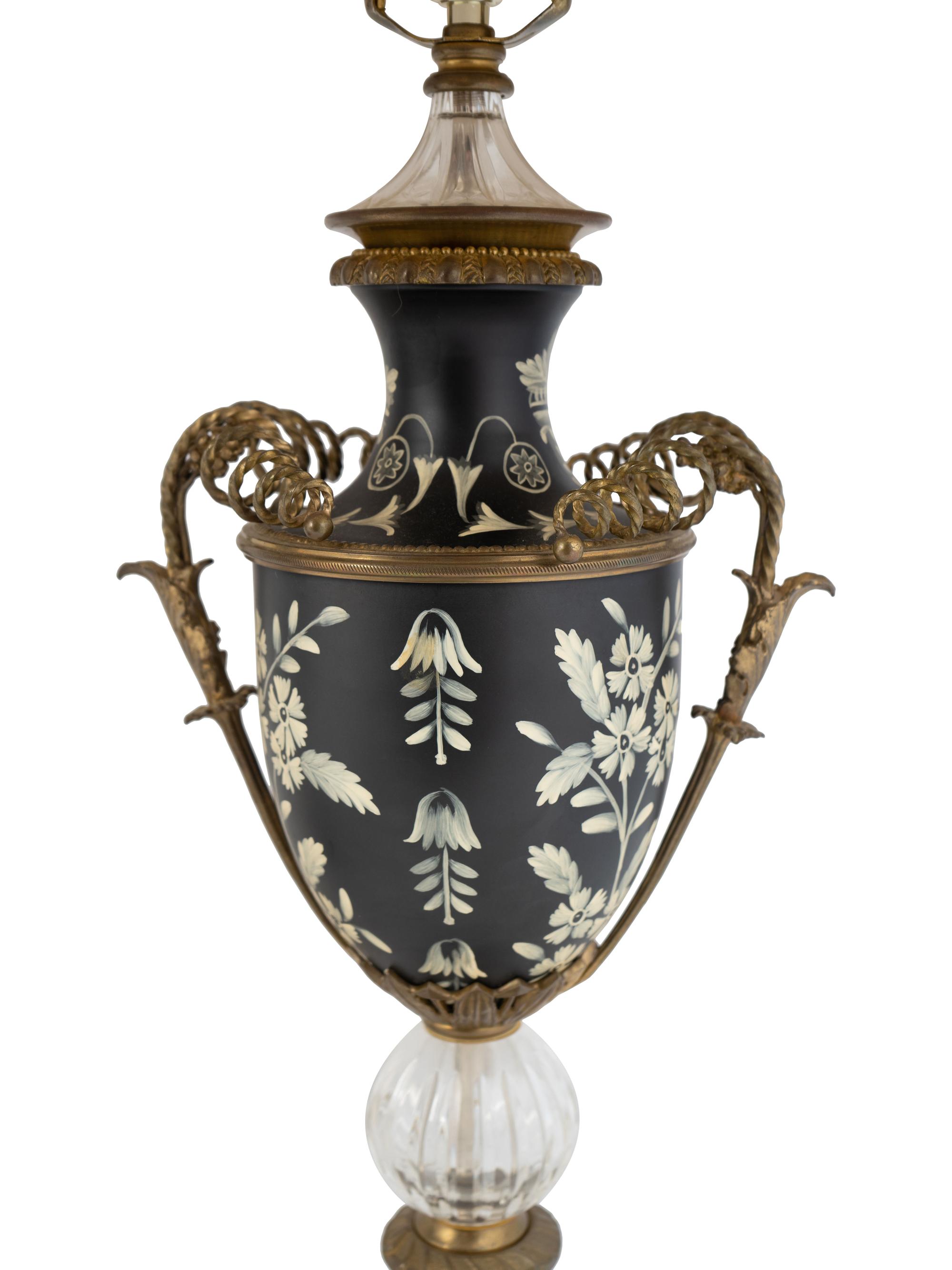 A Pair of Tole and Glass Lamps