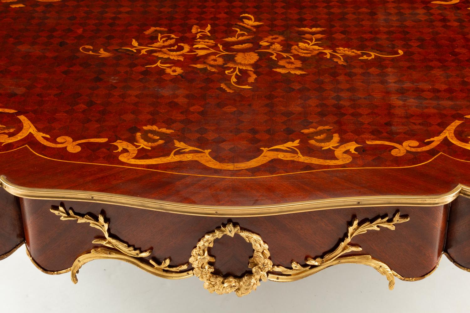 A Louis XV Style Gilt Bronze Mounted Marquetry Low Table