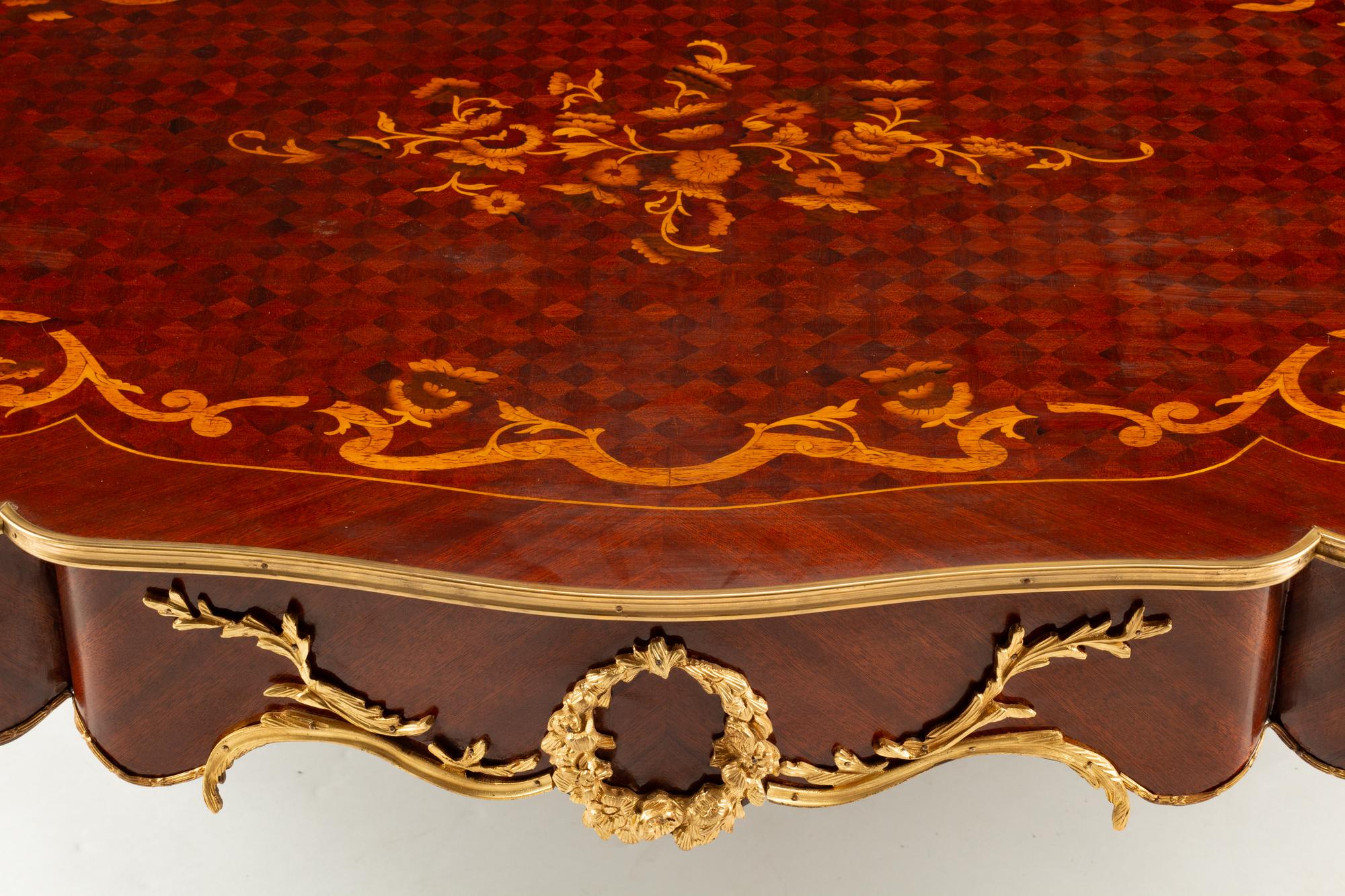 A Louis XV Style Gilt Bronze Mounted Marquetry Low Table