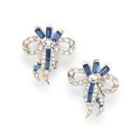 A Pair of Pell Bow Earclips, 1" x 1".