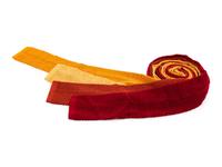 Four Hermes knit ties, one yellow, one red, one orange, one burnt orange.