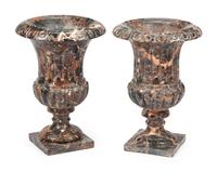 A Pair of Italian Neoclassical Style Variegated Marble Urns