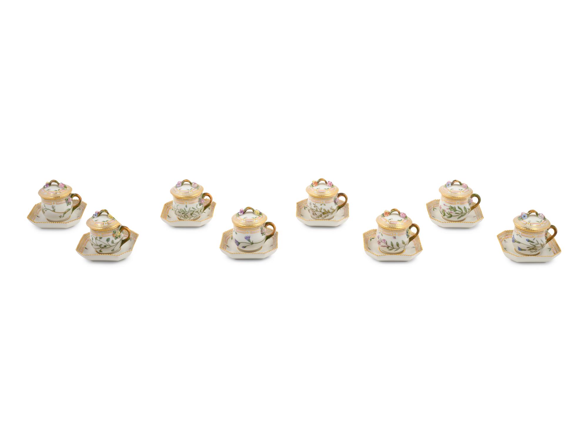 A Set of Eight Royal Copenhagen Flora Danica Pots de Crème and Saucers