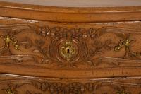 A French Provincial Carved Oak Commode