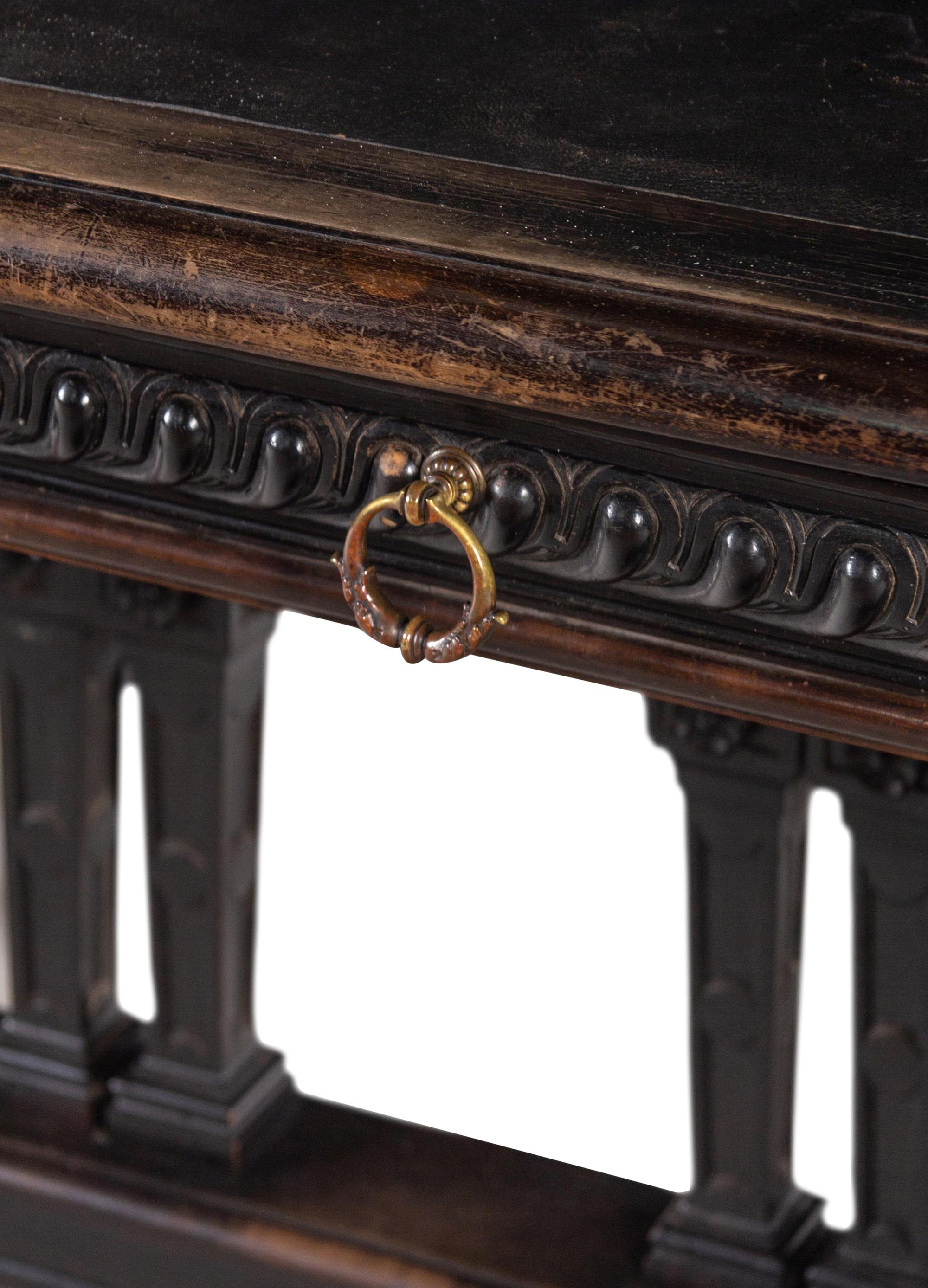 An Italian Renaissance Style Ebonized Library Table