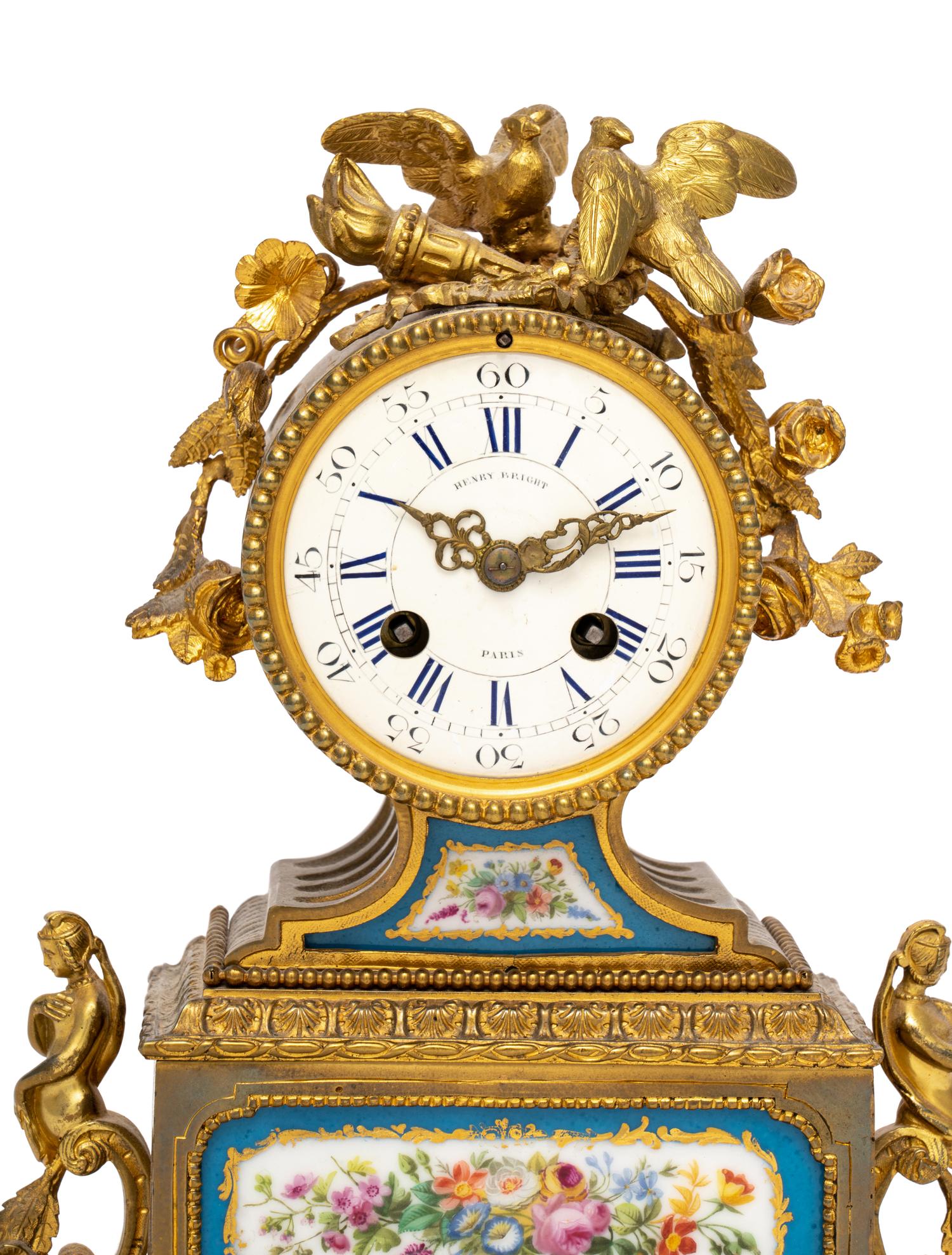 A French Gilt Metal and Porcelain Clock