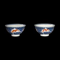 A Pair of Chinese Iron Red and Underglazed Blue 'Bat and Cloud' Bowls, Guangxu Period 清光緒 青花礬紅彩雲蝠紋碗一對