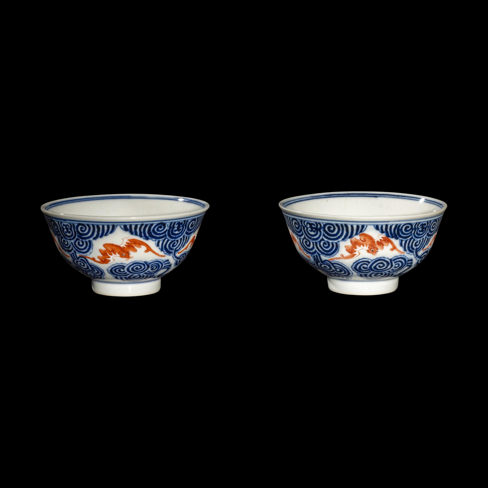 A Pair of Chinese Iron Red and Underglazed Blue 'Bat and Cloud' Bowls, Guangxu Period 清光緒 青花礬紅彩雲蝠紋碗一對