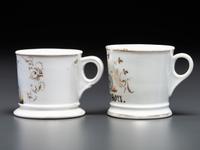 Two Cyclist's Porcelain Shaving Mugs