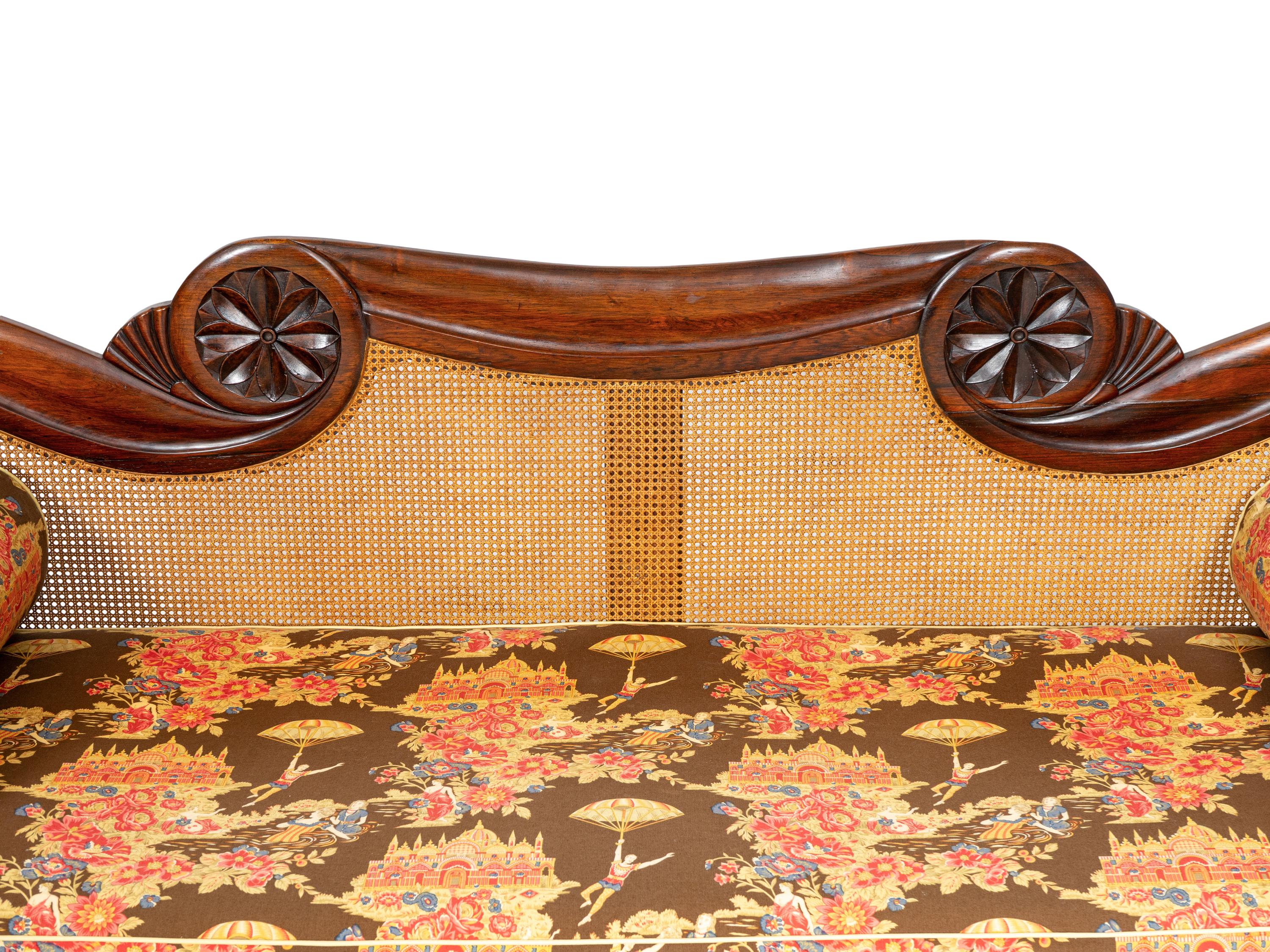 An Anglo-Colonial Carved and Caned Rosewood Settee
