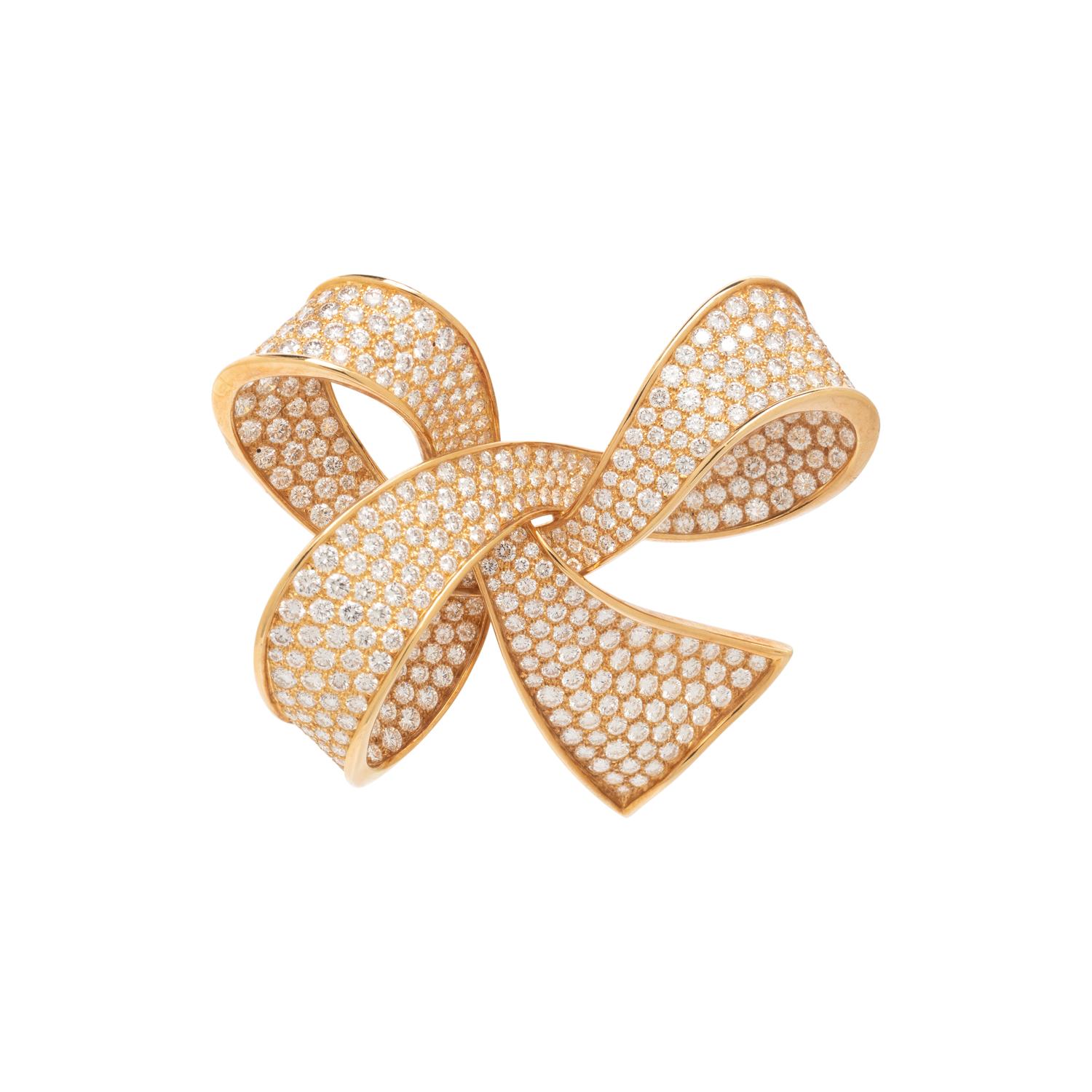 BOUCHERON, YELLOW GOLD AND DIAMOND BOW BROOCH