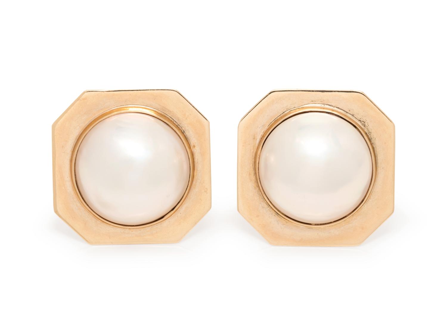 A Pair of 14 Karat Yellow Gold and Cultured Mabe Pearl Earclips,