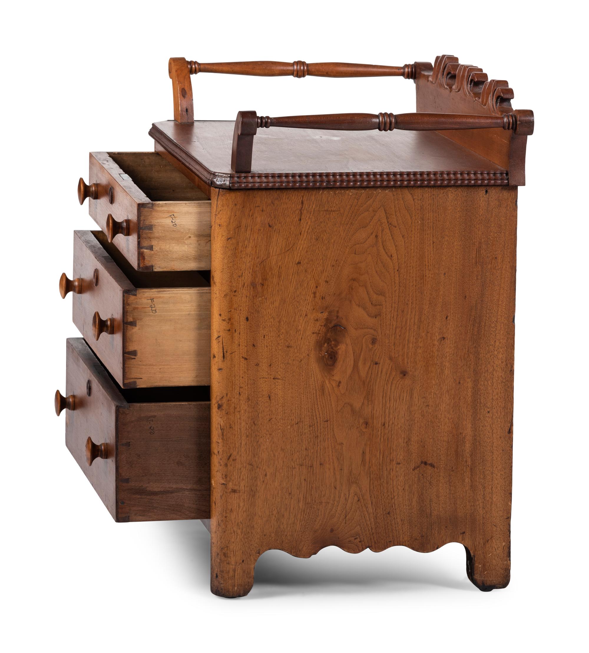 A Victorian Carved Cherrywood Diminutive Chest of Drawers