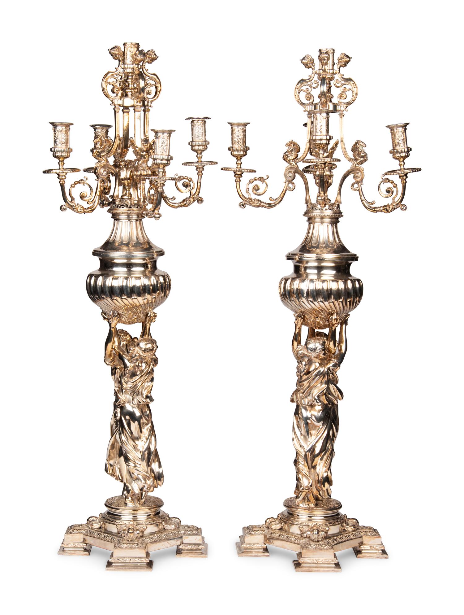 A Pair of Monumental Silver-Plate Figural Six-Light Candelabra