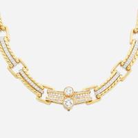 A diamond and gold necklace