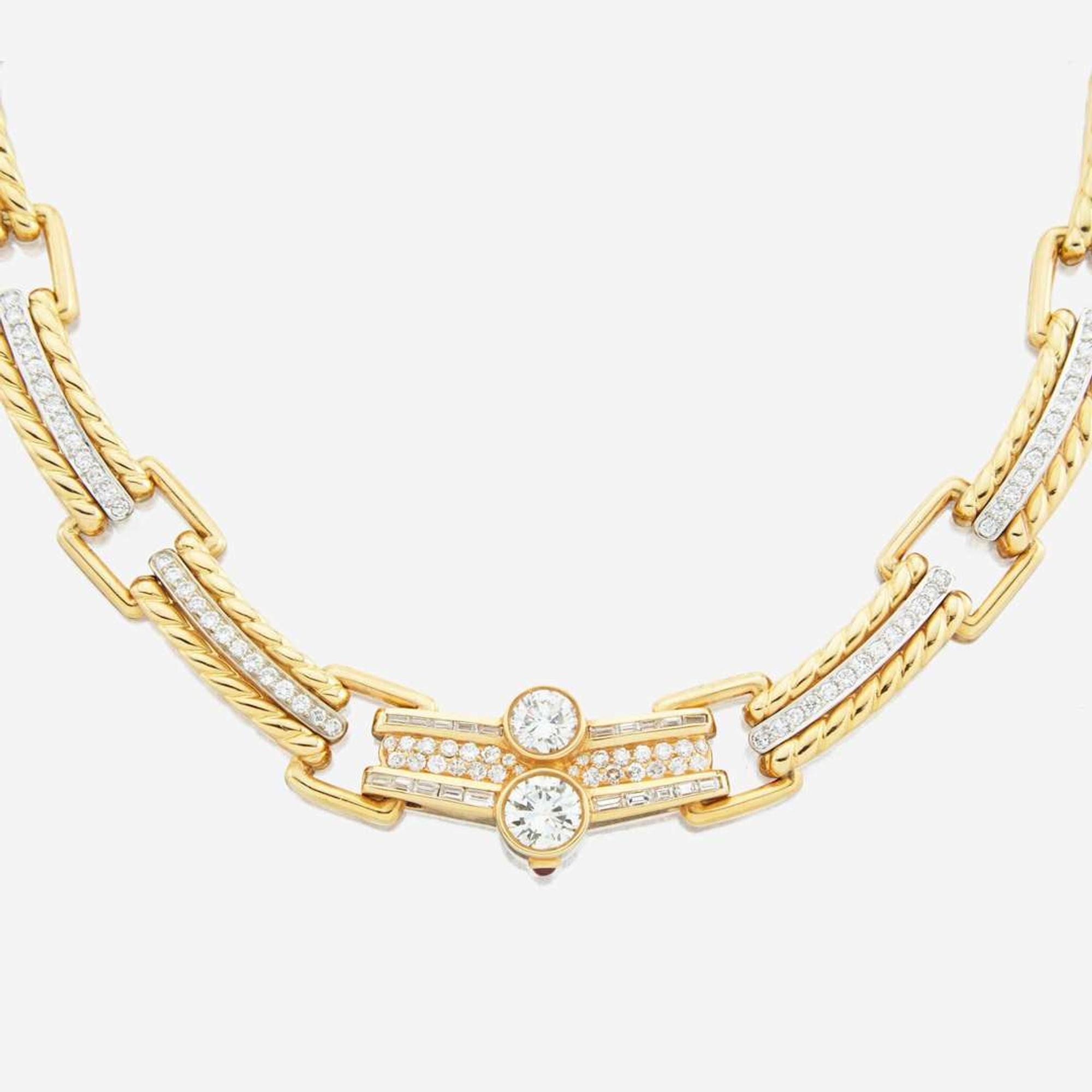 A diamond and gold necklace