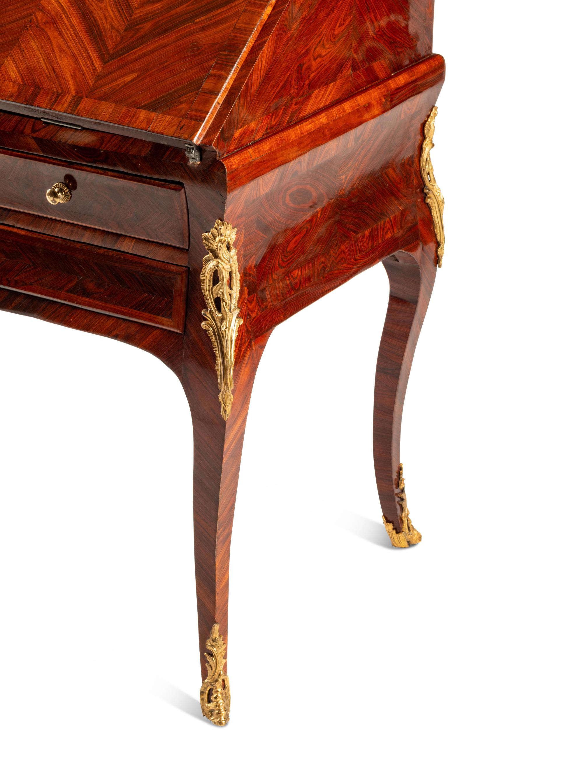 A Louis XV Gilt Bronze Mounted Bookmatched Tulipwood Bureau en Pente