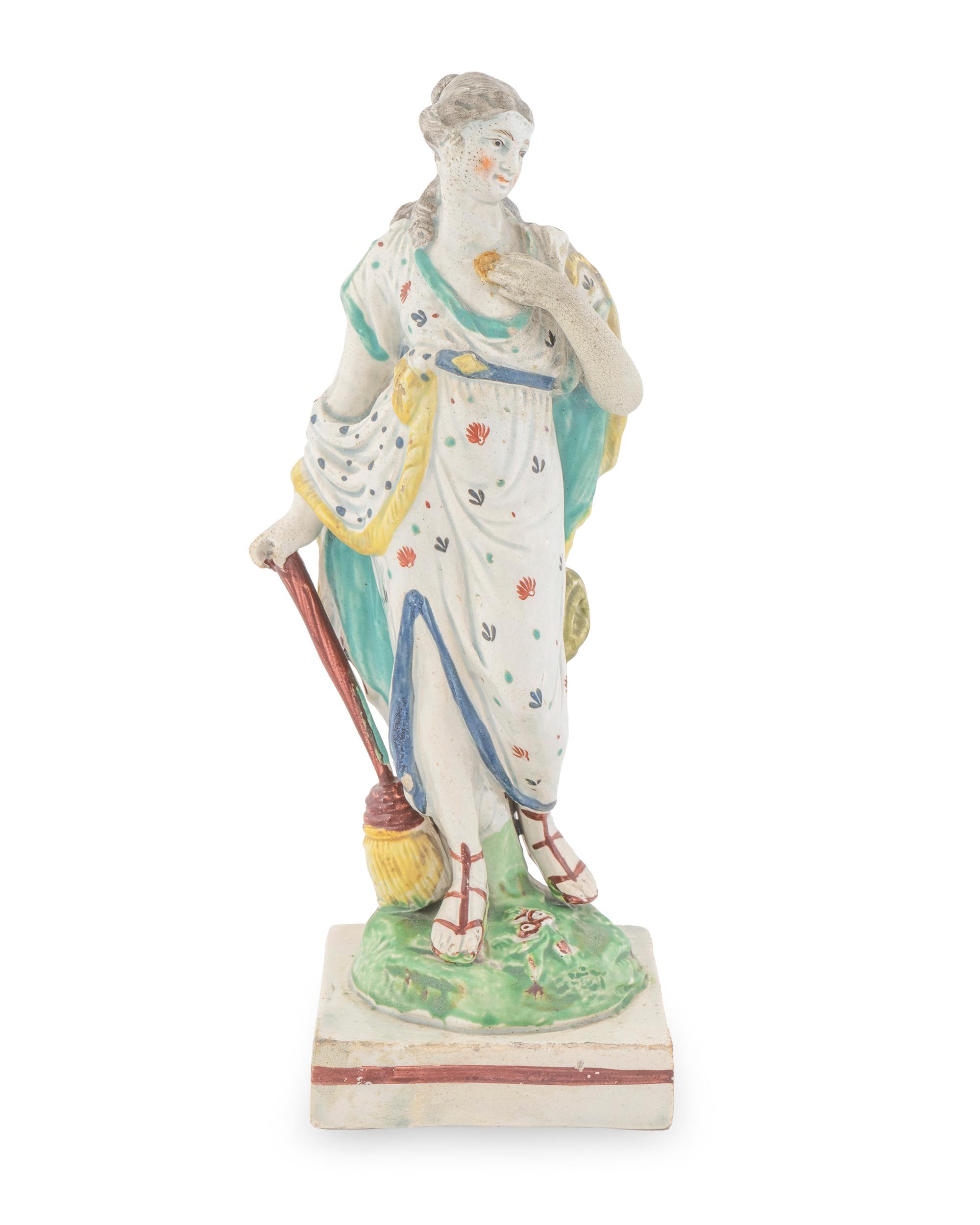 A Wedgwood Pearlware Figure of a Classical Woman with Broom — LATE 18TH CENTURY