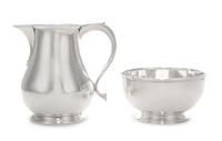 A George VI Silver Creamer and Sugar Bowl, Walter Wilson, London, 1947, each of plain baluster form on stepped bases.