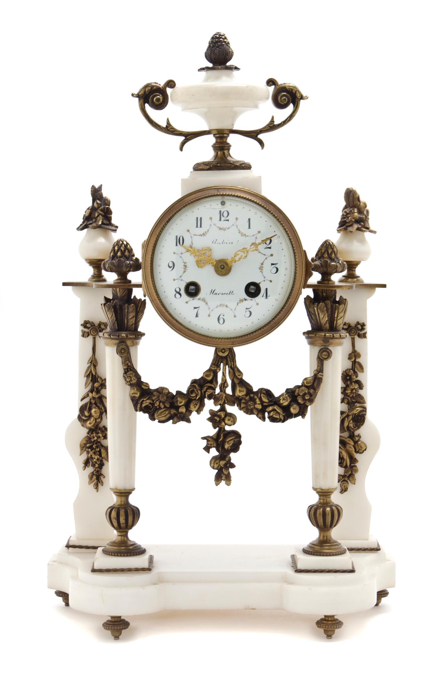 A French Marble and Gilt Bronze Portico Clock, Height 15 1/2 inches.