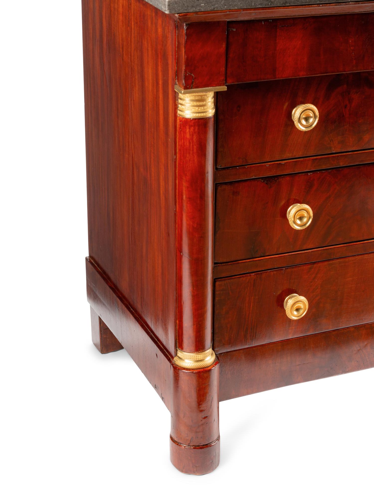 An Empire Style Gilt Bronze Mounted Mahogany Marble-Top Commode