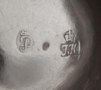 A French Silver Water Pitcher, Maker's Mark Coronet Surmounting a Script JH, Control Mark Coronet Surmounting a Script P, of baluster f
