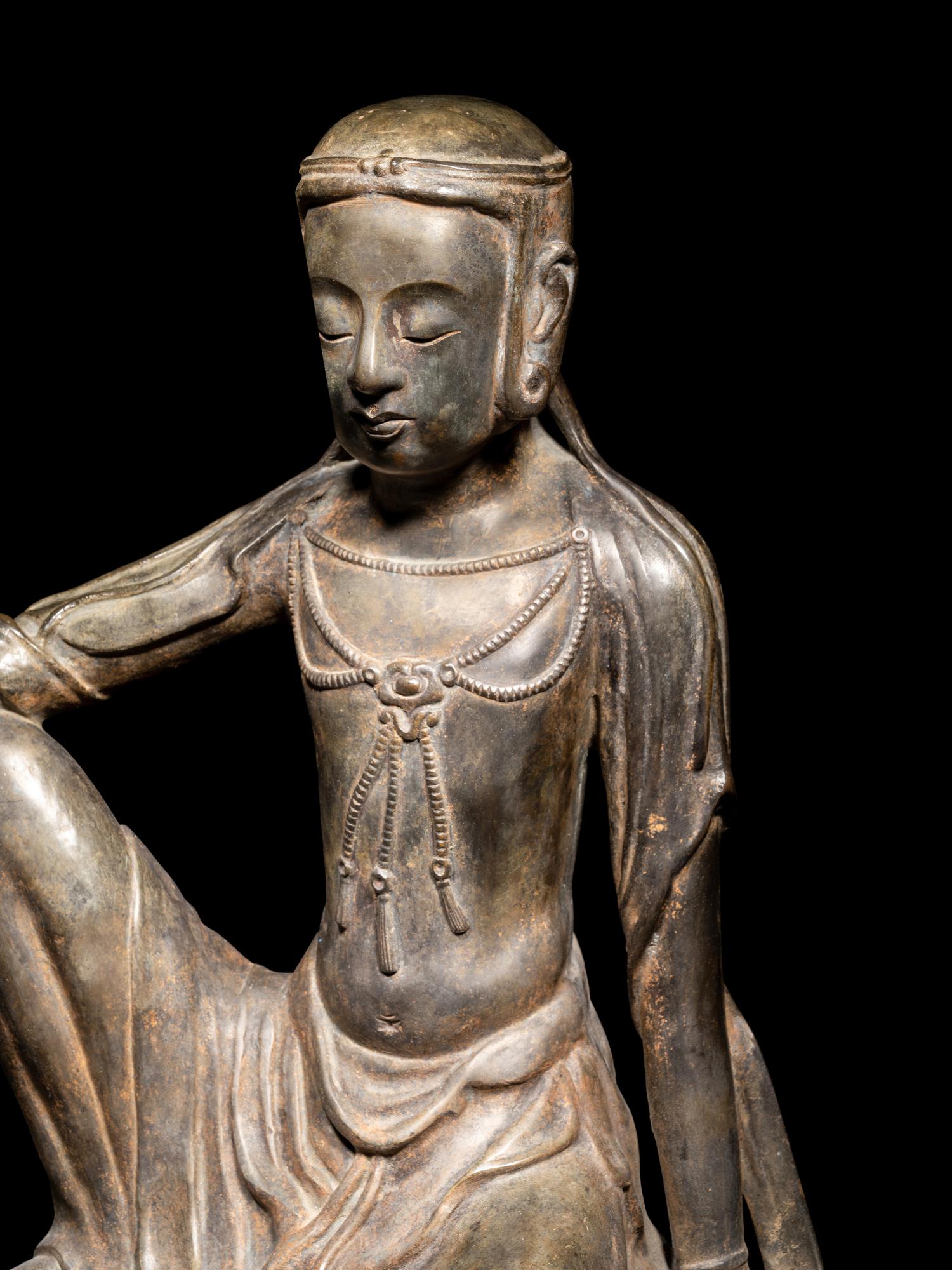 A Bronze Figure of Seated Buddha