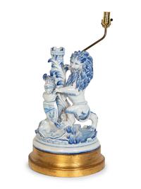 A Continental Faience Lion Group Mounted as a Lamp