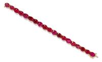 A 14 Karat Yellow Gold and Ruby Line Bracelet, 21.60 dwts.