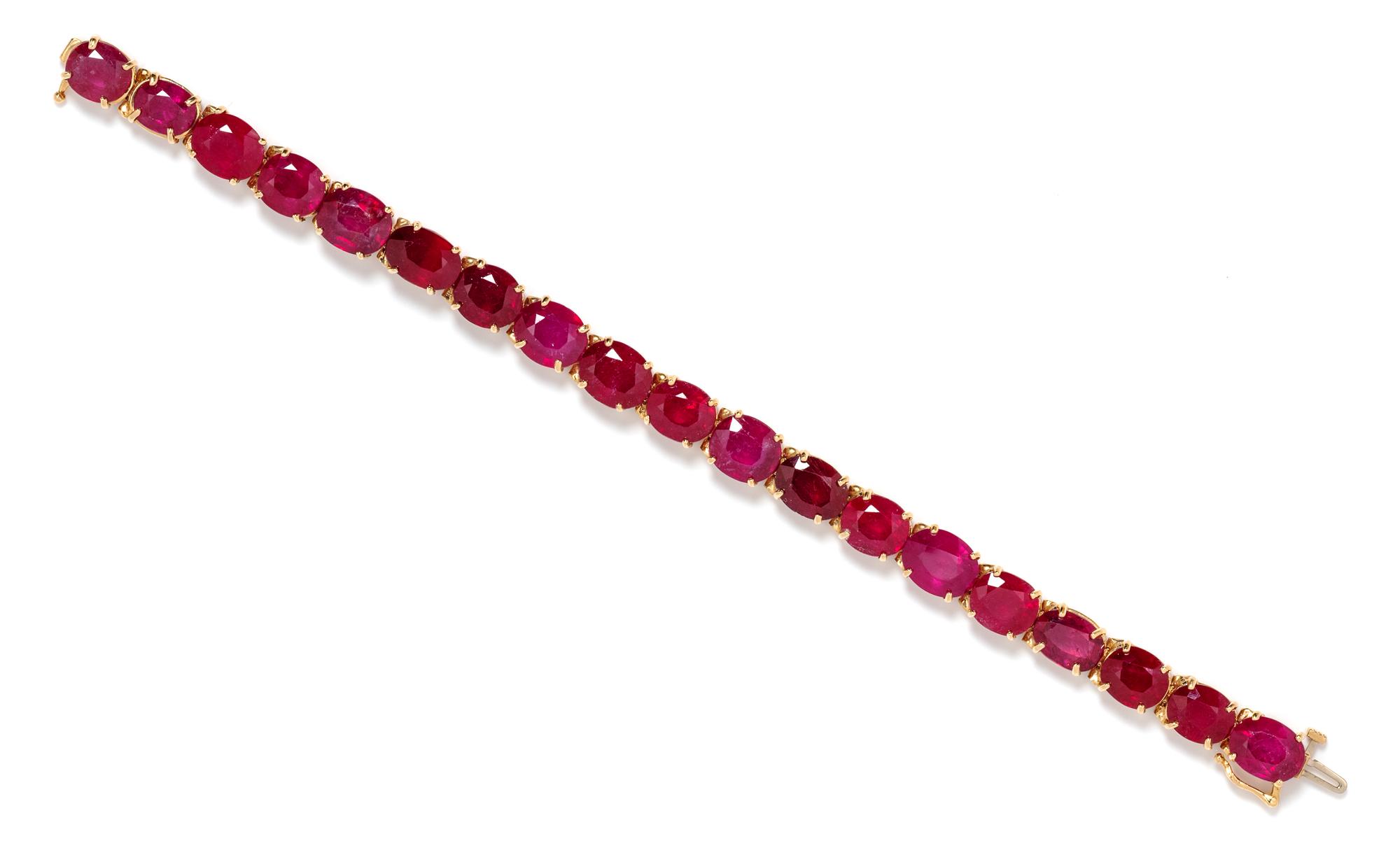 A 14 Karat Yellow Gold and Ruby Line Bracelet, 21.60 dwts.