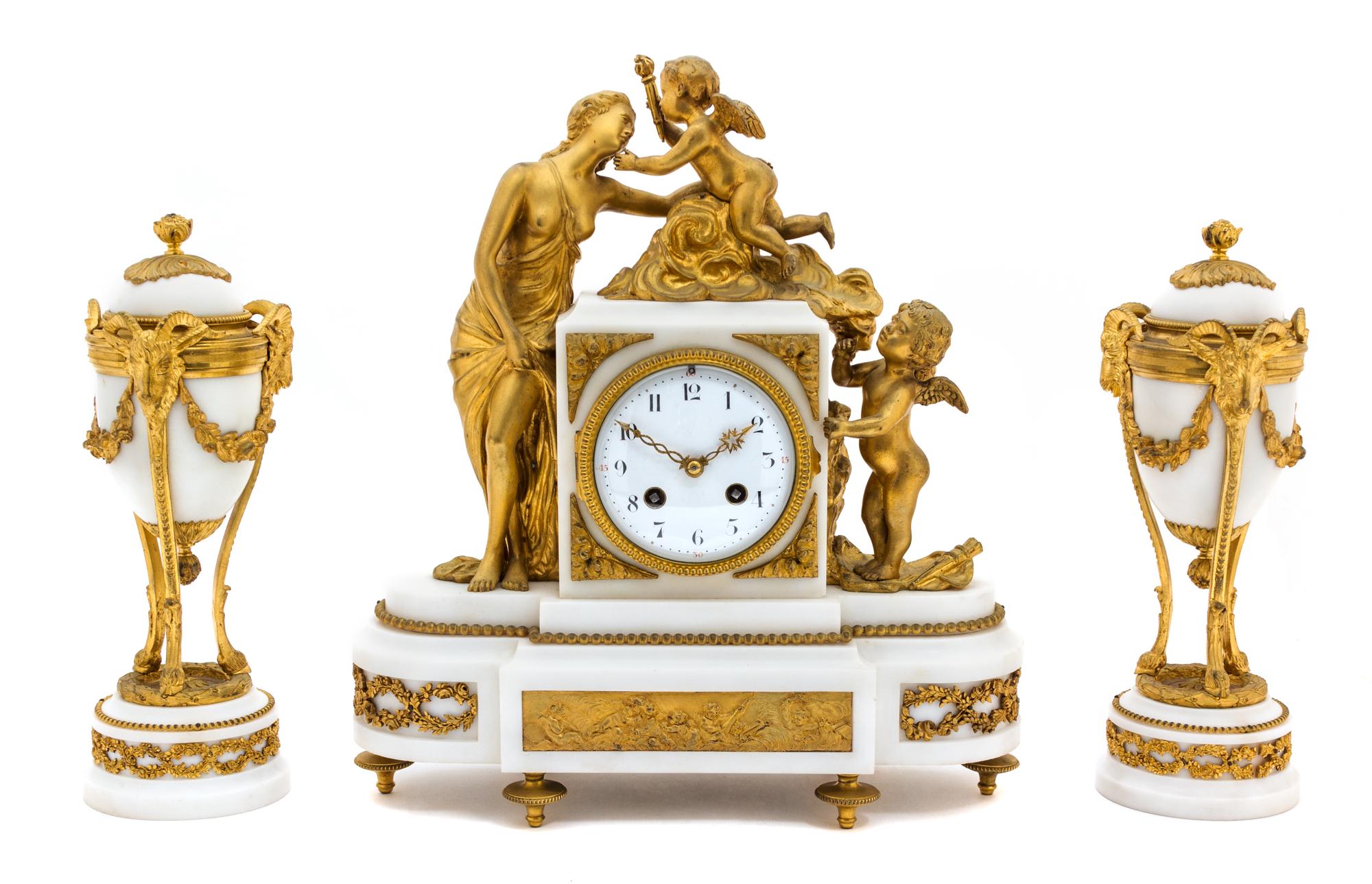 A Louis XVI Style Gilt Bronze Mounted Marble Clock Garniture Height of clock 14 1/2 inches. — 19TH CENTURY