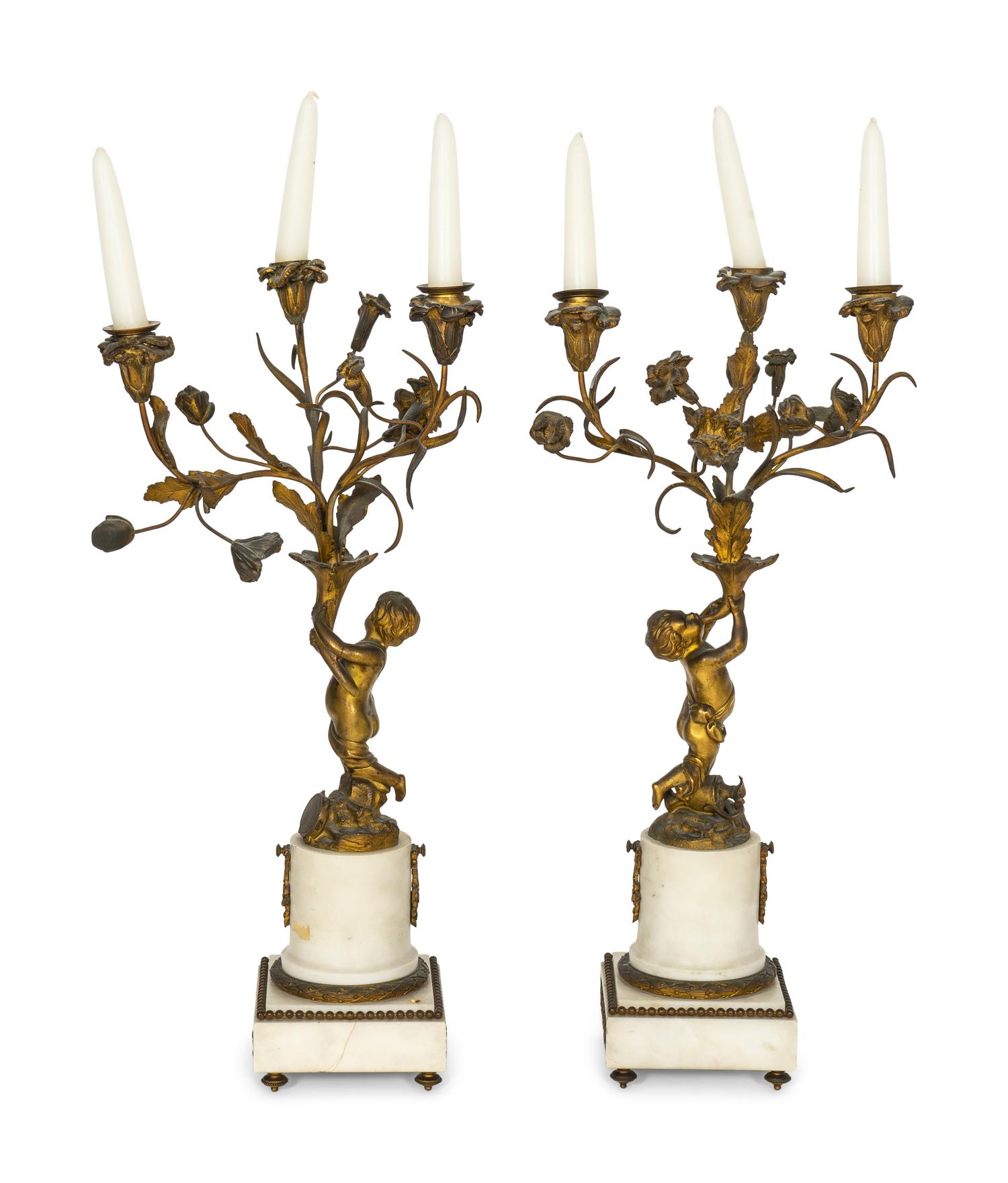 A Pair of French Gilt Bronze and Alabaster Three-Light Candelabra