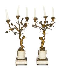 A Pair of French Gilt Bronze and Alabaster Three-Light Candelabra