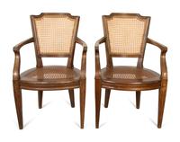 A Pair of Italian Caned Armchairs