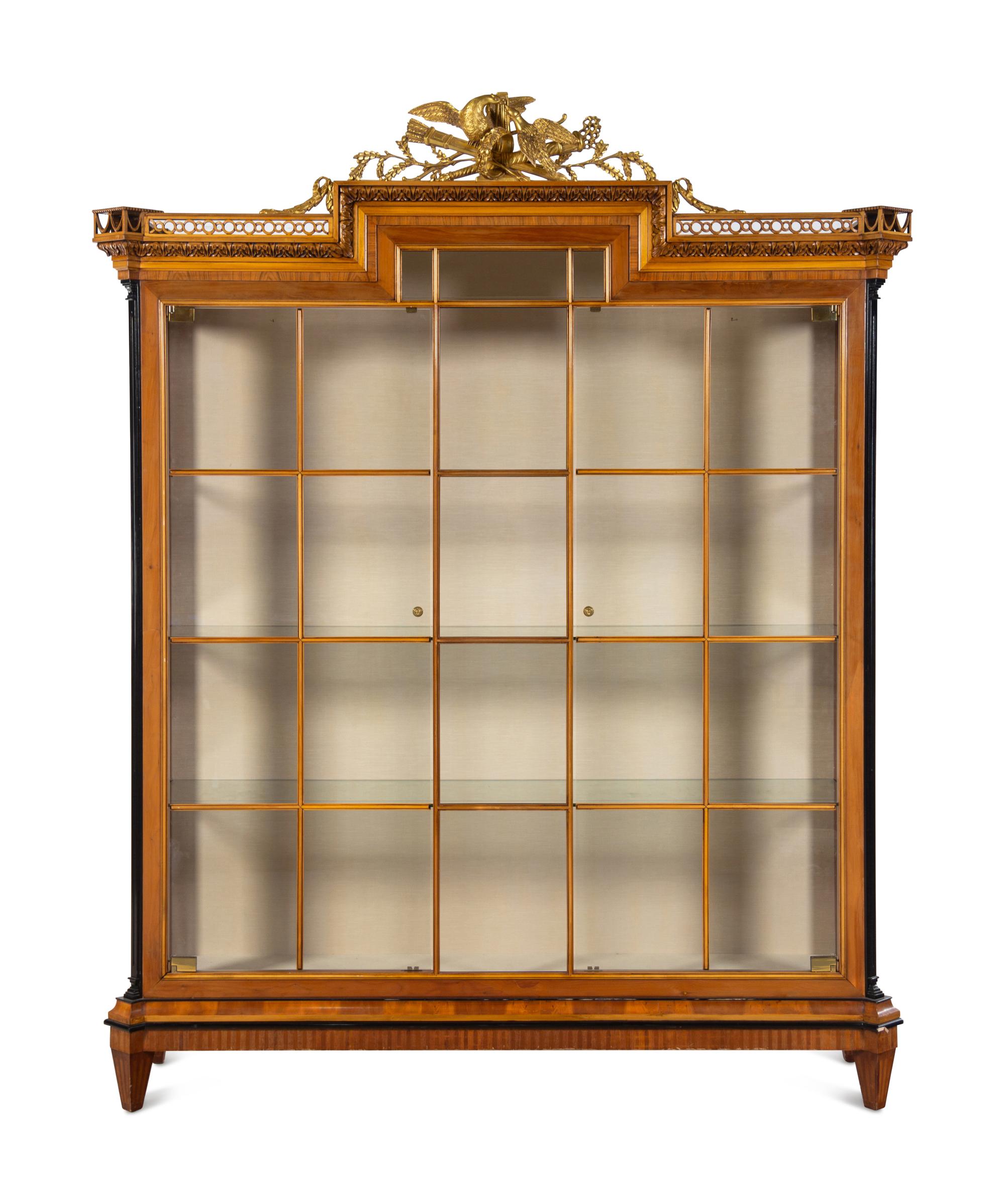 A Baker Neoclassical Style Parcel Gilt Walnut Vitrine Cabinet