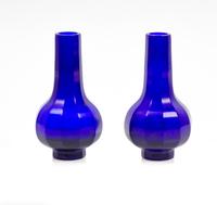 A Pair of Cobalt-Blue Glass Faceted Bottle Vases Height 6 inches. — 19TH CENTURY