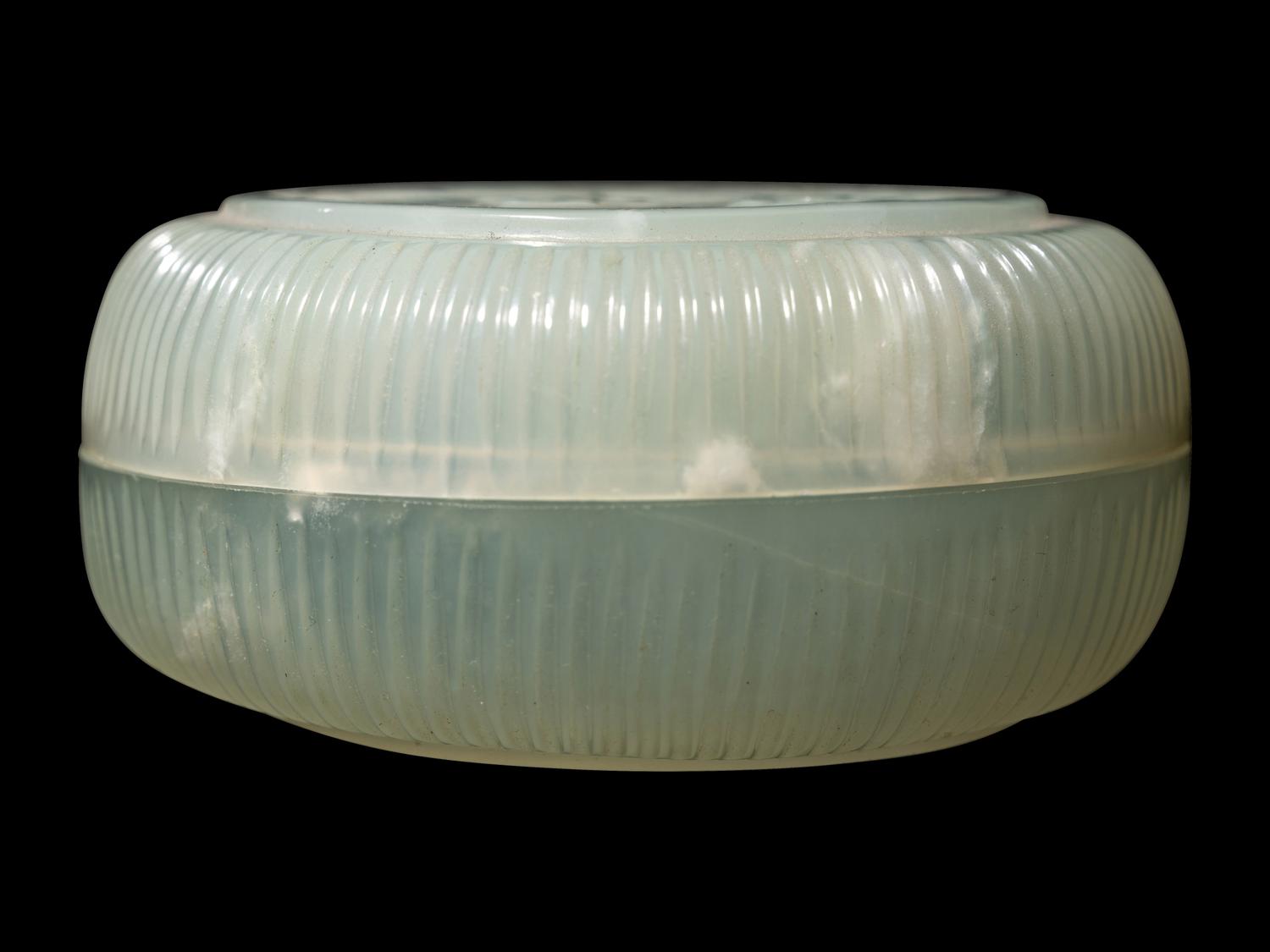 A Small Chinese White Jade Circular Covered Box and A Chinese Dark Spinach Jade Covered Vase