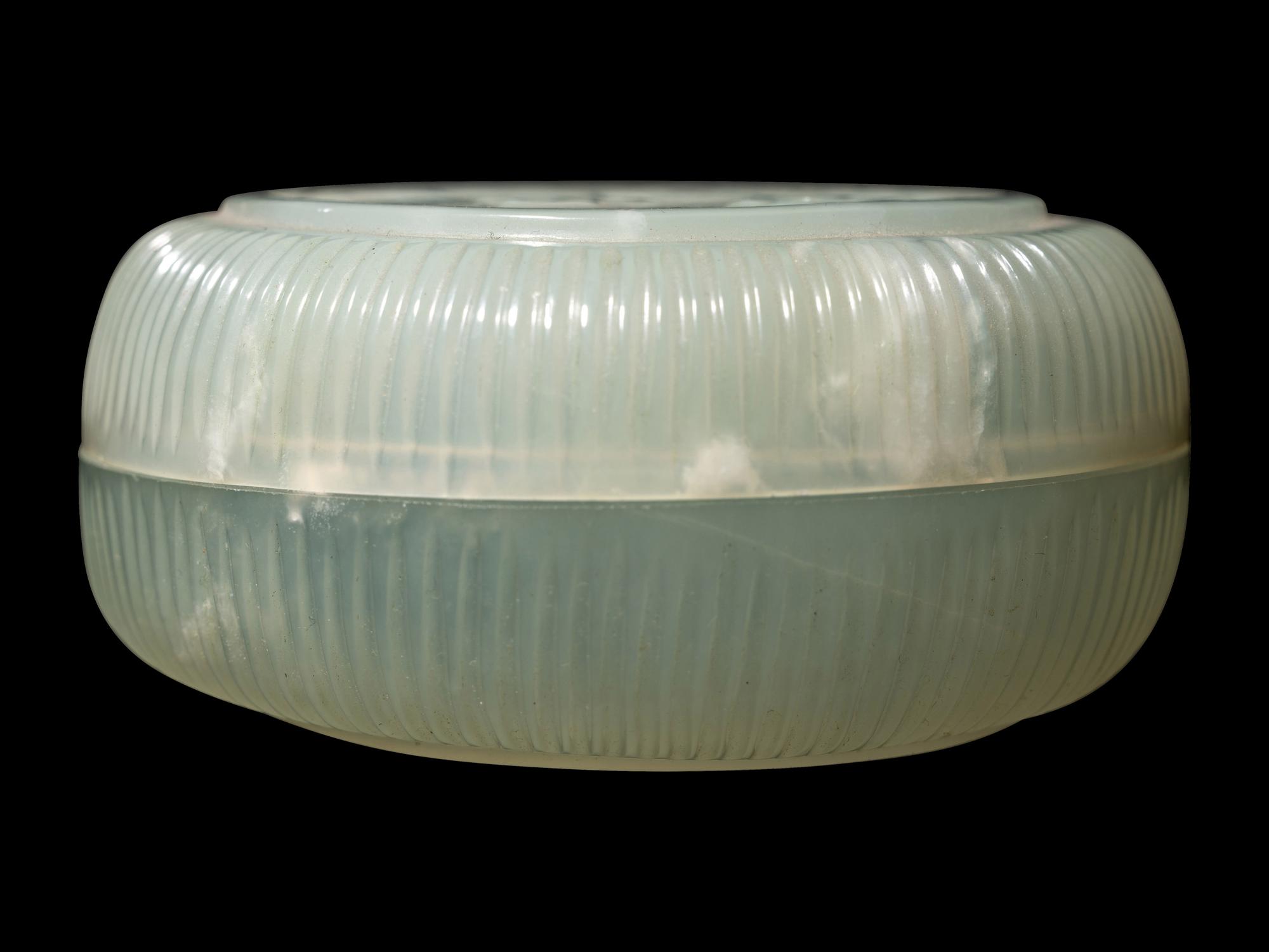 A Small Chinese White Jade Circular Covered Box and A Chinese Dark Spinach Jade Covered Vase