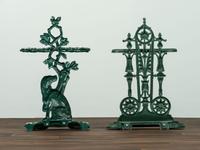 Two Green Painted Cast-Iron Umbrella Stands