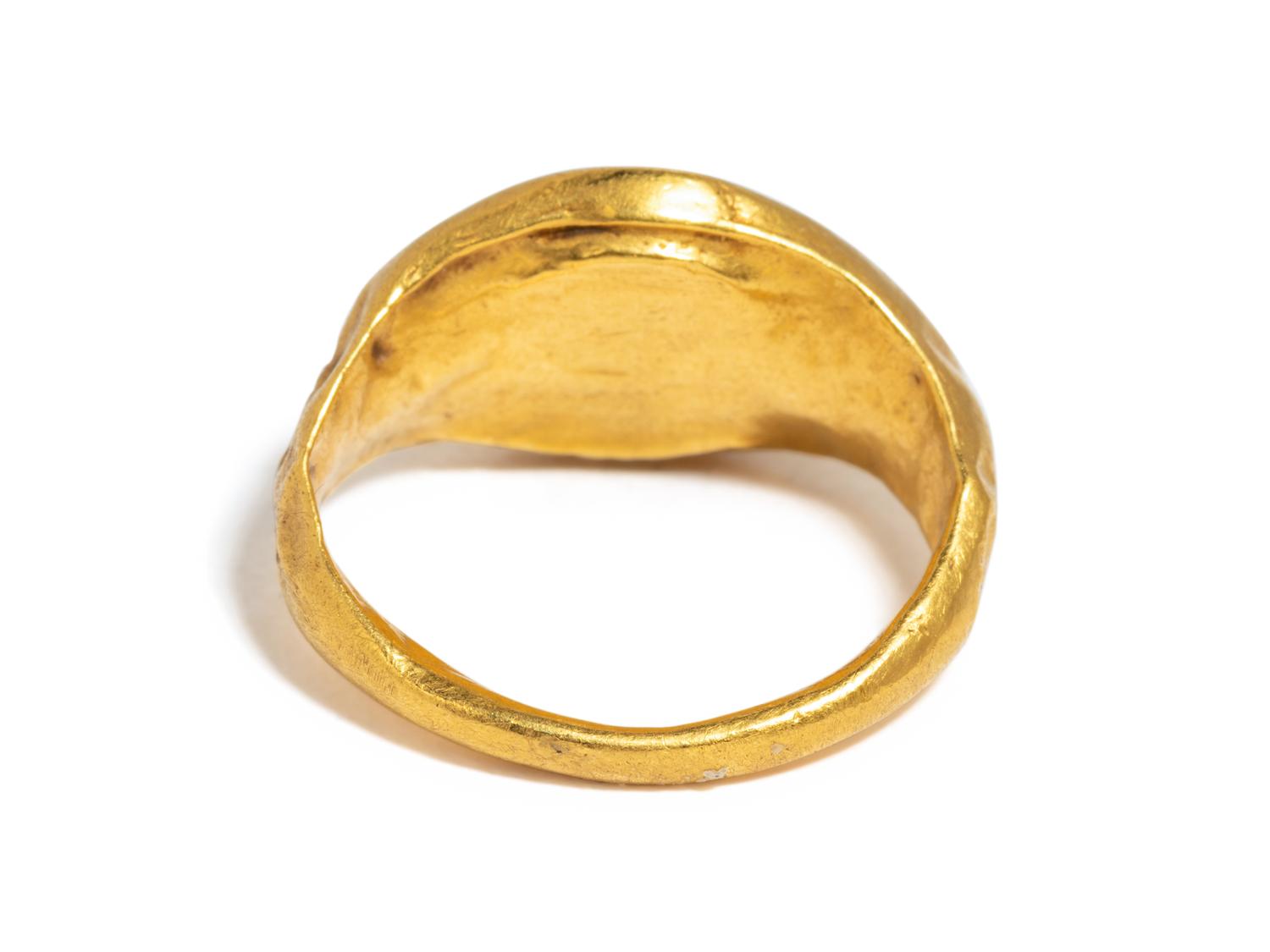 A Roman Gold and Carnelian Finger Ring with the Portrait Head of a Youth, Possibly Phoebus