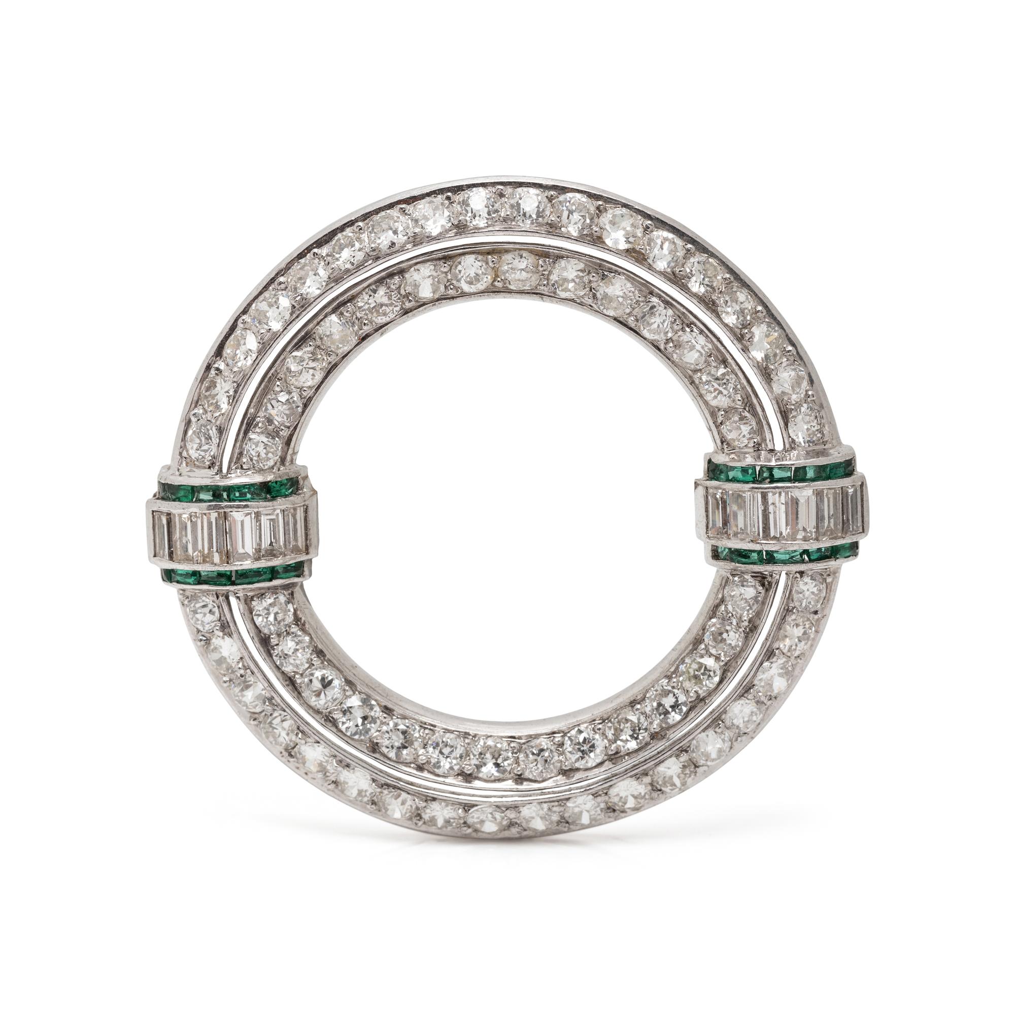 ART DECO, DIAMOND AND SYNTHETIC EMERALD CIRCLE BROOCH