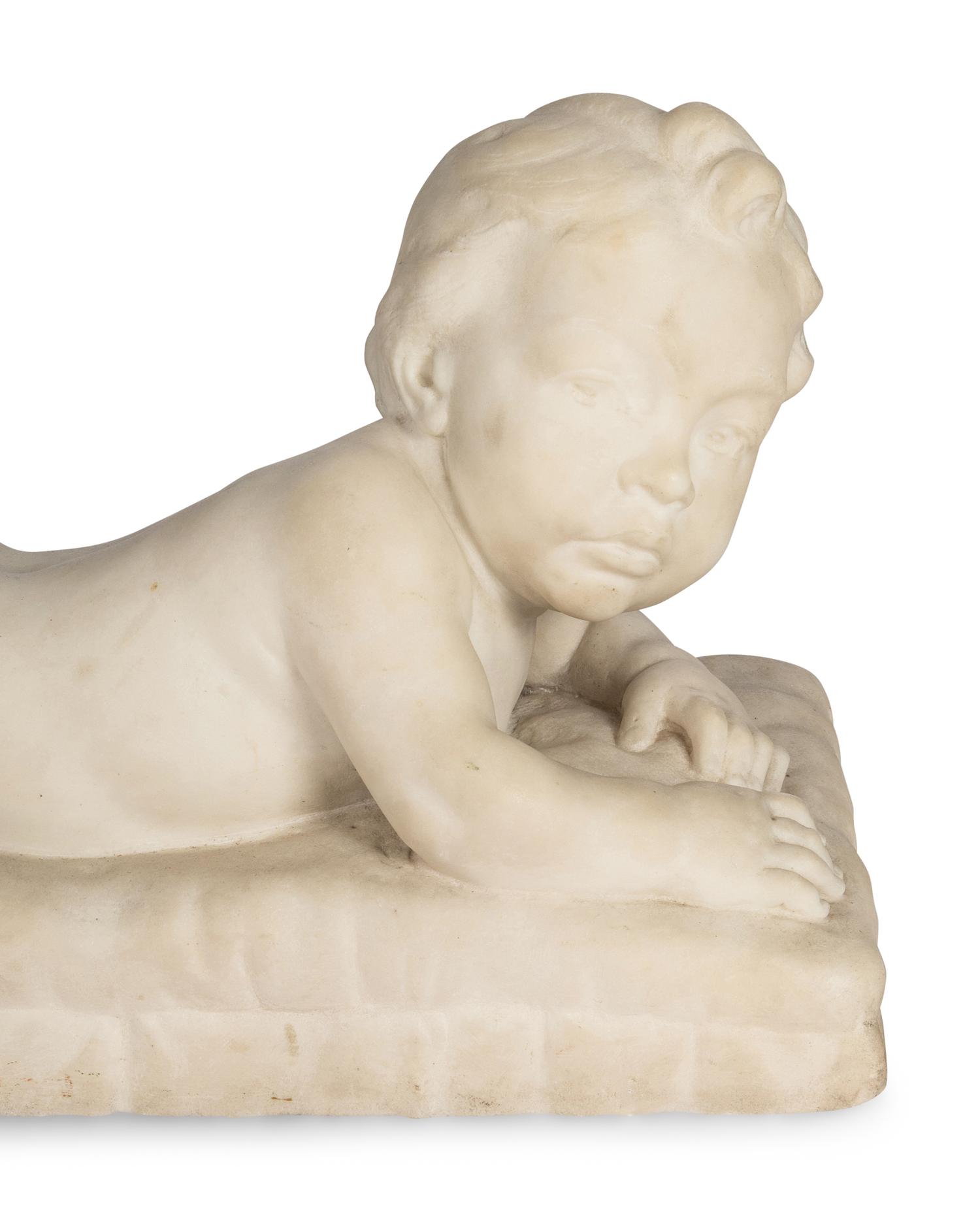 A Carved Marble Figure of a Baby