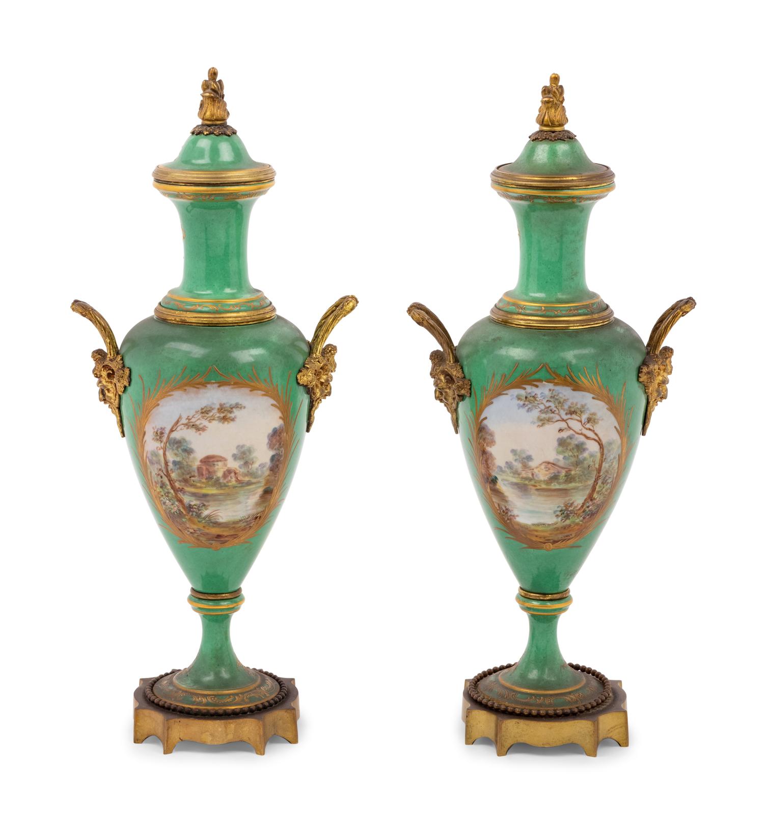 A Pair of Sèvres Style Gilt Metal Mounted Porcelain Urns