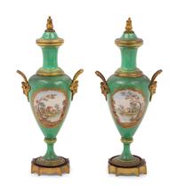 A Pair of Sèvres Style Gilt Metal Mounted Porcelain Urns