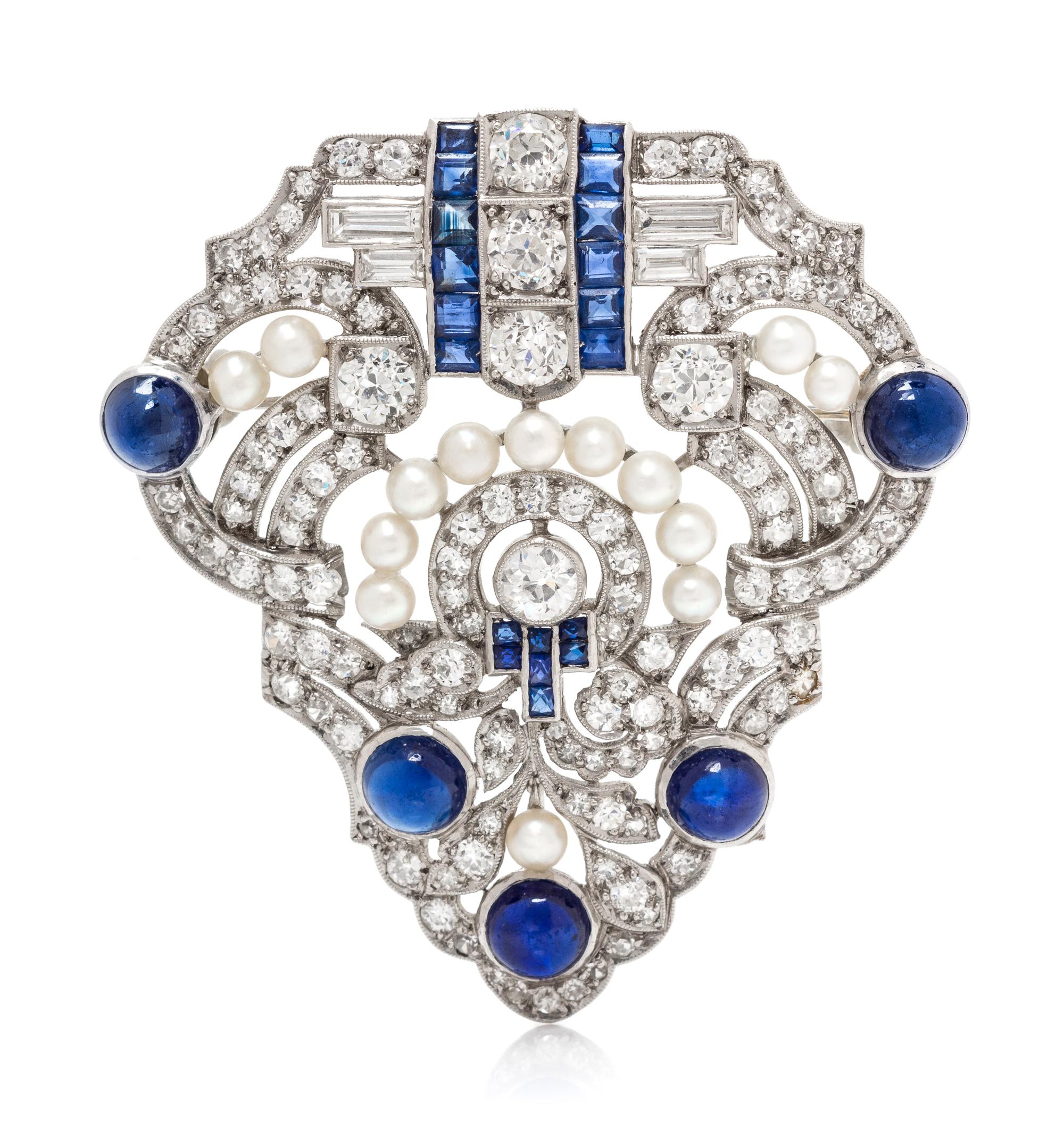 An Art Deco Platinum, Diamond, Seed Pearl and Sapphire Brooch, 12.75 dwts.