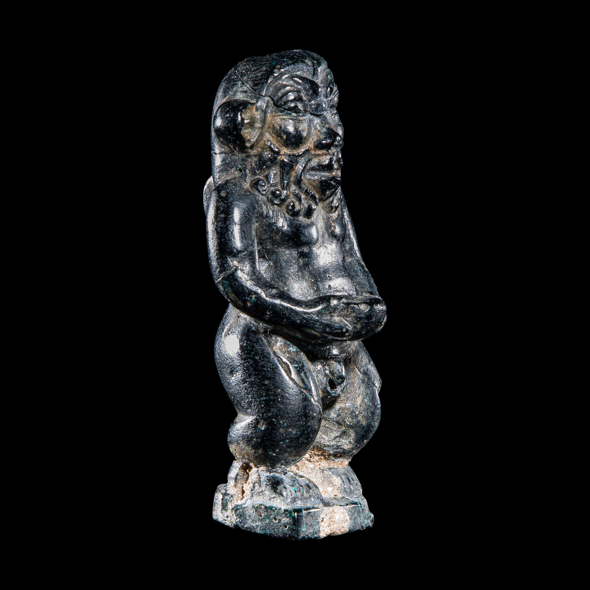 An Egyptian Glass Bes