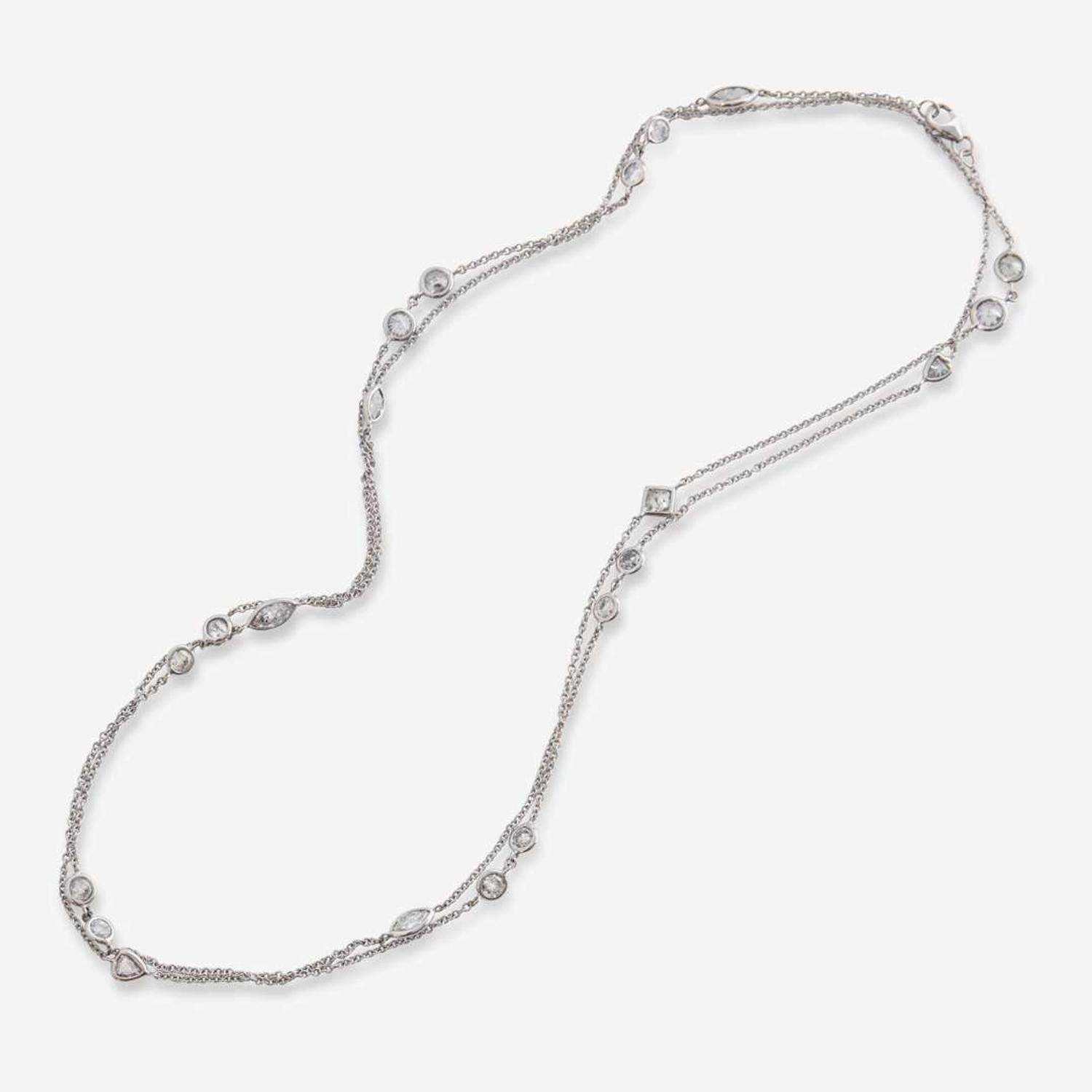 An 18K White Gold and Diamond Station Necklace
